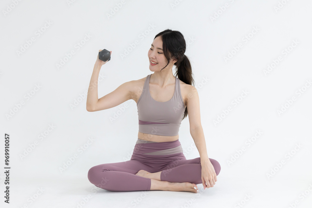Isolated asian woman with dumbbell exercise on white background Isolated asian woman with dumbbell exercise on white background