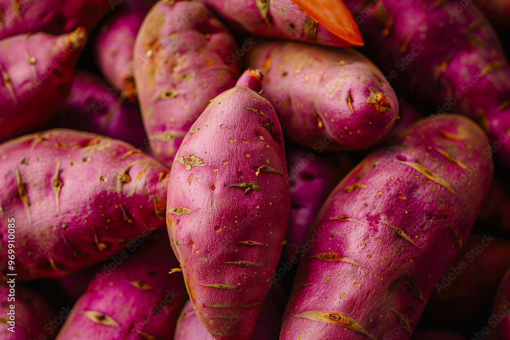 A pile of fresh sweet potatoes, close-up, background image wallpaper A pile of fresh sweet potatoes, close-up, background image wallpaper