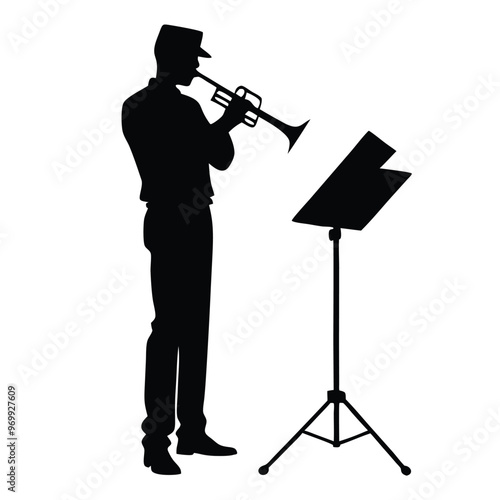 a man playing the trumpet. He is standing in front of a music stand with a sheet of music on it