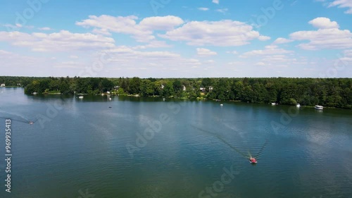 Beautiful aerail view of lake Peetzsee at Grünheide and  boats on water photo