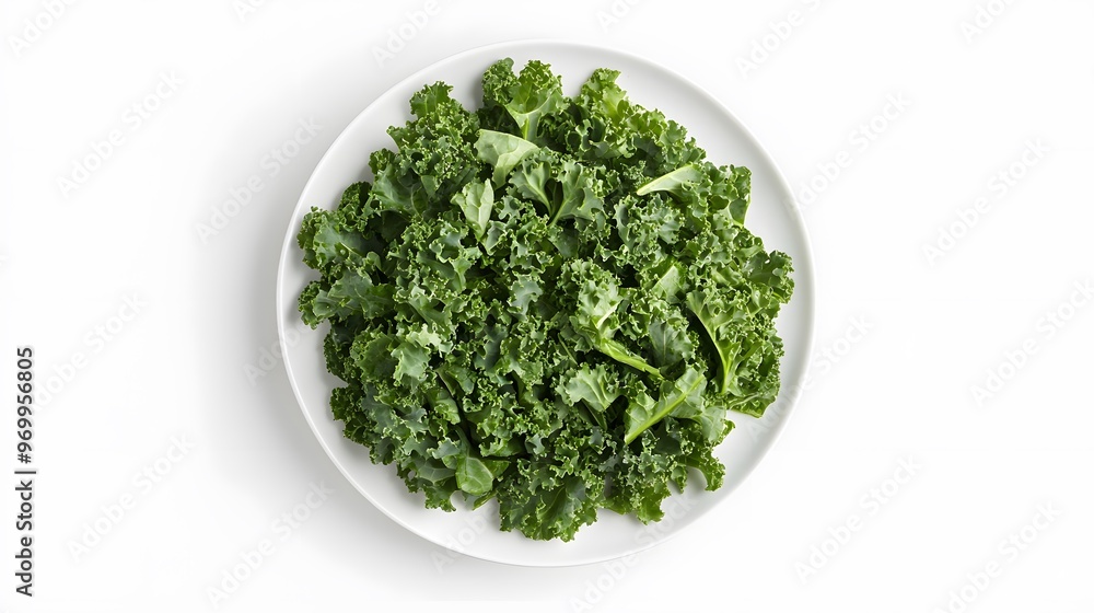 Fresh green kale on white plate - healthy organic superfood for salads and smoothies Fresh green kale on white plate - healthy organic superfood for salads and smoothies