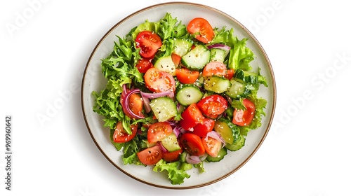 Fresh vegetable salad with crisp lettuce, juicy tomatoes, and crunchy cucumbers on a plate