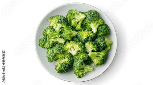 Fresh broccoli florets in ceramic bowl on white background