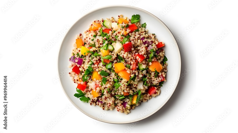 Colorful quinoa salad with fresh vegetables and herbs on white plate Colorful quinoa salad with fresh vegetables and herbs on white plate