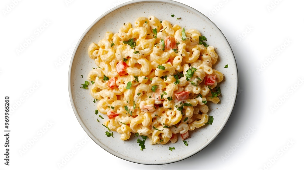 Creamy macaroni salad with fresh vegetables and herbs on a rustic plate Creamy macaroni salad with fresh vegetables and herbs on a rustic plate