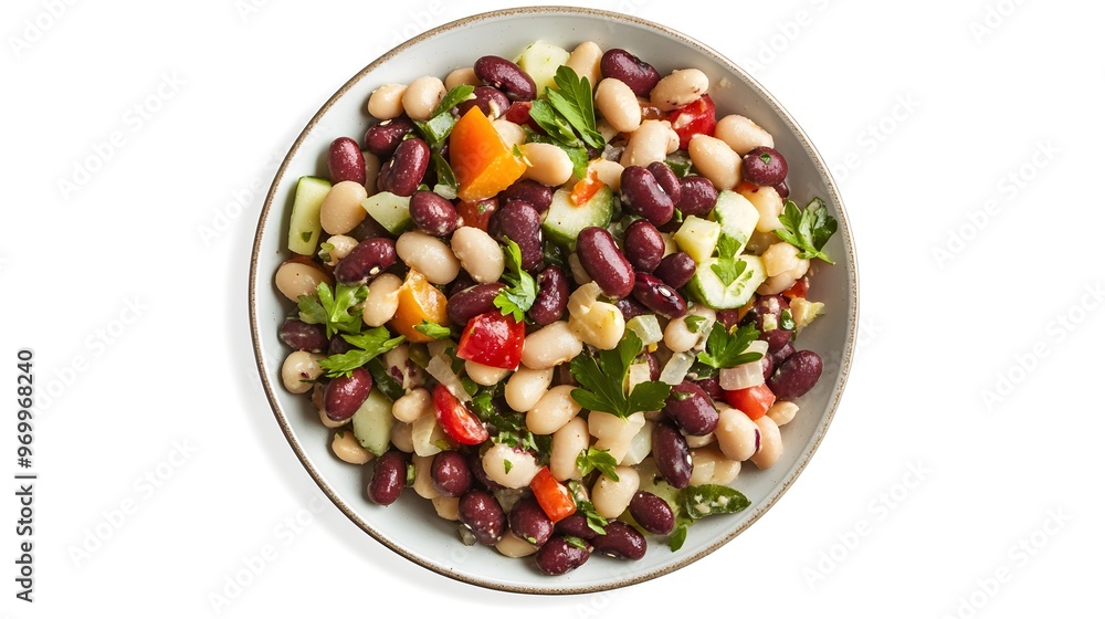 Colorful mixed bean salad with vegetables on white plate Colorful mixed bean salad with vegetables on white plate