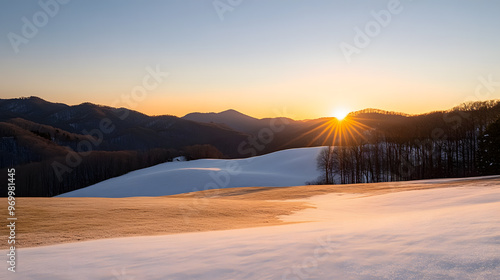 Early Morning Sun Casting Golden Glow Over Snow-Capped Mountain, Serene Sunrise and Winter Landscape