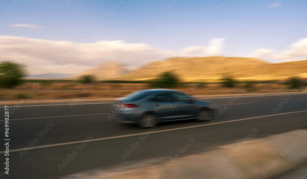 Blurred Car Speeding Along a Scenic Road in Turkey