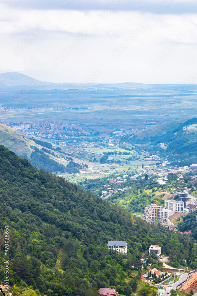 Naklejka premium above view of mountain valley with Tsaghkadzor tow