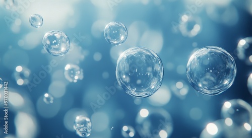 Bubbles rising through clear water in bright sunlight during a peaceful under...