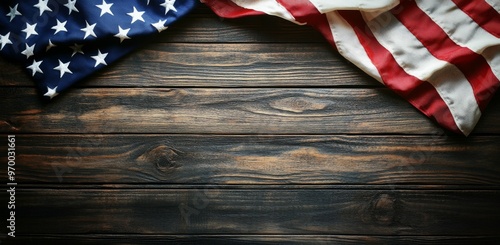 American flag draped over rustic wooden surface in a calm, patriotic setting