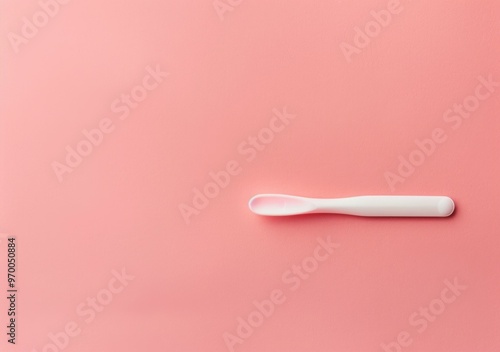 white spoon on pink background, minimalistic design, kitchen utensil, clean aesthetic, modern style, simple composition, ideal for culinary themes, food related concepts, kitchen decor