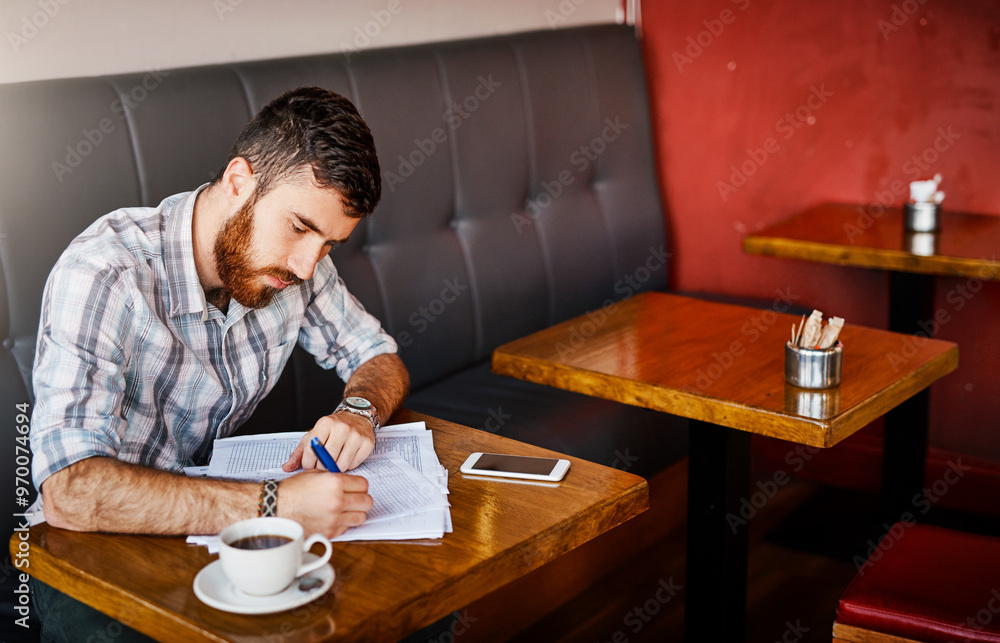 Business, owner and writing with documents at cafe for finance planning, vendor contract and inventory budget. Male person, paperwork and customer feedback form, sales profit and reading information Business, owner and writing with documents at cafe for finance planning, vendor contract and inventory budget. Male person, paperwork and customer feedback form, sales profit and reading information