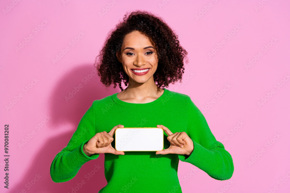 Photo portrait of pretty young girl show white screen horizontal wear trendy green outfit isolated on pink color background Photo portrait of pretty young girl show white screen horizontal wear trendy green outfit isolated on pink color background
