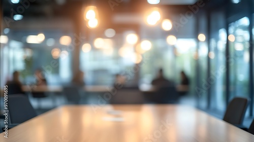 Blurred background of a modern office meeting room with table and chairs