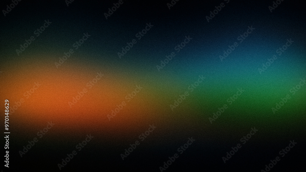 Obraz premium A dynamic abstract gradient background blending orange, green, and blue hues. The grainy texture and smooth transitions create a rich, atmospheric effect, perfect for digital backdrops and modern desi