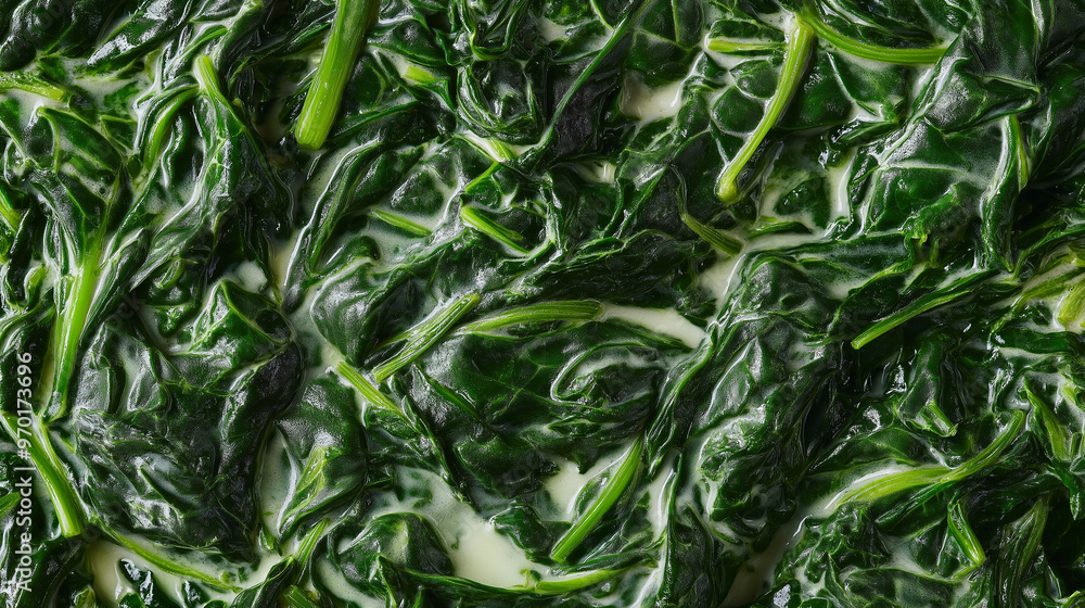 a close-up, top-down view of creamed spinach, filling the entire frame with the focus on the rich, creamy dish a close-up, top-down view of creamed spinach, filling the entire frame with the focus on the rich, creamy dish