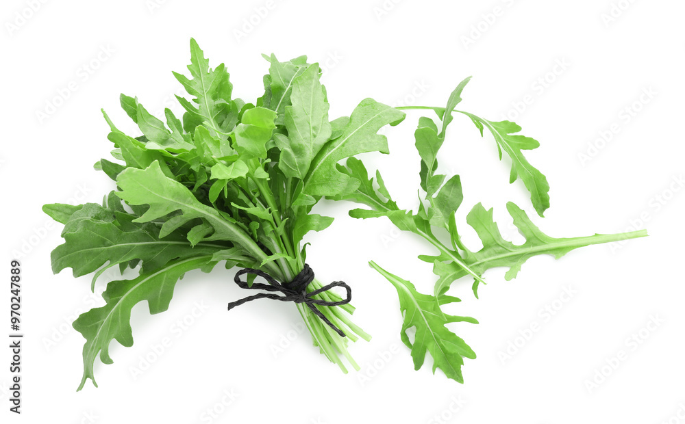 Fresh arugula leaves isolated on white, top view Fresh arugula leaves isolated on white, top view