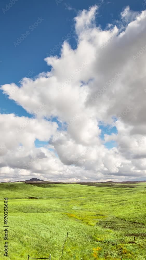 Time lapse of puffy clouds above of the empty prairies of South Dakota Time lapse of puffy clouds above of the empty prairies of South Dakota