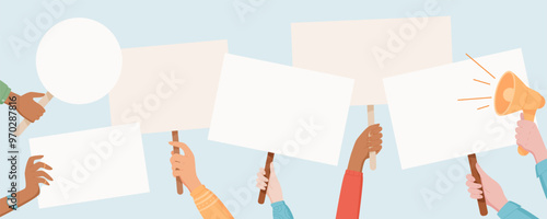 Protest signs are held high by a diverse hands. People raise placards and banners with a strong message. Human hand lift blank boards, showing unity, solidarity and support in the demonstration.
