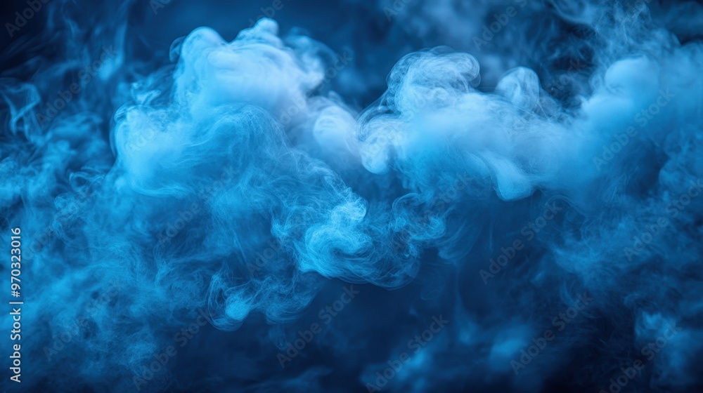 Abstract blue smoke background with white smoke swirling in water, creating an ethereal and fluid effect.
Abstract blue smoke background with white smoke swirling in water, creating an ethereal and fluid effect.