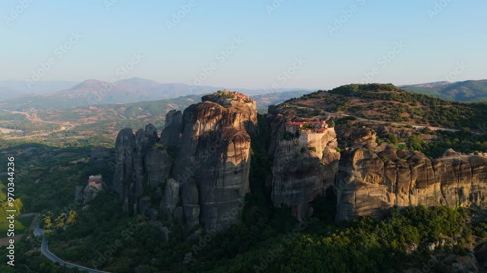 Greece Meteora region unique mountain formations and monasteries on it 4k videos taken with drone at sunrise Greece Meteora region unique mountain formations and monasteries on it 4k videos taken with drone at sunrise
