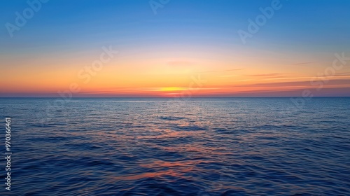 A serene ocean view at sunset, showcasing vibrant colors reflecting on the water's surface.