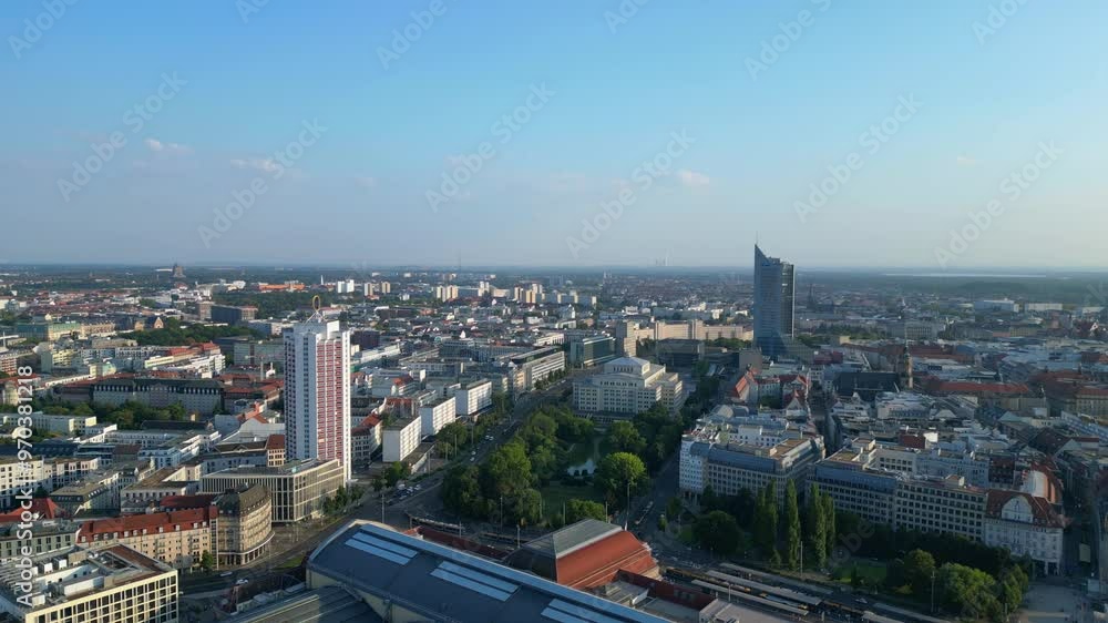 Opera House leipzig Main station in germany, trains waiting for passengers to board. Fabulous aerial view flight fly reverse drone Opera House leipzig Main station in germany, trains waiting for passengers to board. Fabulous aerial view flight fly reverse drone