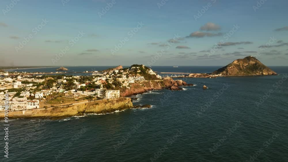 Aerial tracking shot in front of the cityscape of Mazatlan, golden hour in Mexico Aerial tracking shot in front of the cityscape of Mazatlan, golden hour in Mexico