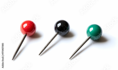 various pushpins on white background. each one is shot separately