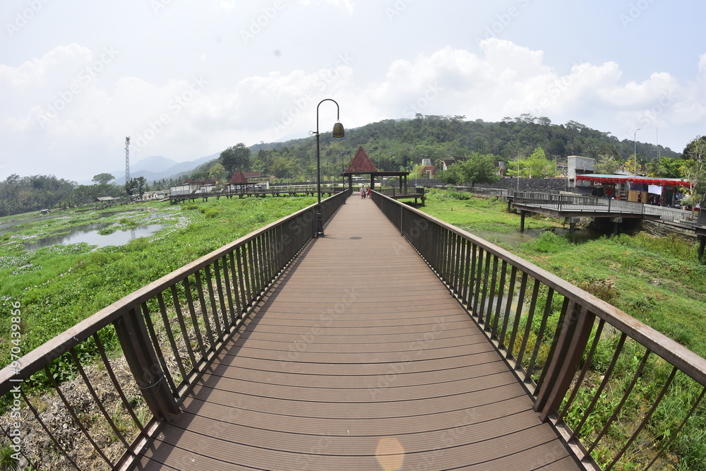 The bridge and wooden architecture built above Rawa Pening Lake has now become an aesthetic tourist spot for the people of Indonesia. The bridge and wooden architecture built above Rawa Pening Lake has now become an aesthetic tourist spot for the people of Indonesia.