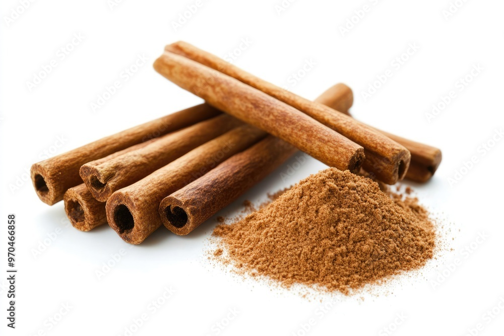 Aromatic Cinnamon Sticks and Powder Arranged on White Background Aromatic Cinnamon Sticks and Powder Arranged on White Background