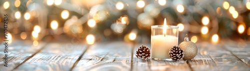 Warm and cozy holiday scene featuring candles and pine cones on a wooden surface with soft glowing lights in the background.