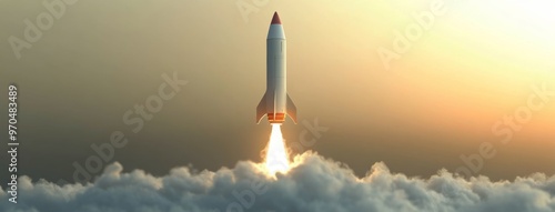 A colorful rocket launches into the sky, rising above fluffy clouds at sunset