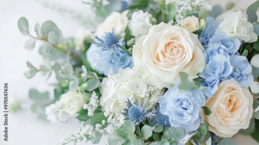 A bouquet of flowers with blue and white flowers. The flowers are arranged in a way that they look like they are in a vase. The bouquet has a fresh and vibrant look to it A bouquet of flowers with blue and white flowers. The flowers are arranged in a way that they look like they are in a vase. The bouquet has a fresh and vibrant look to it