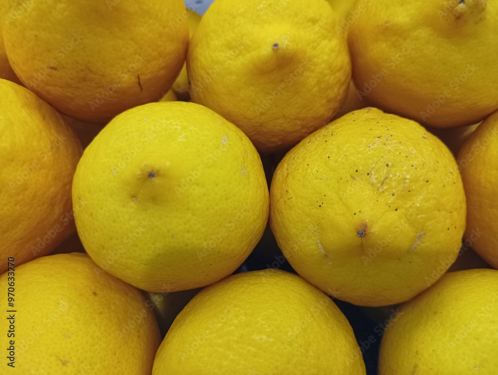 Close-up of a Group of Yellow Lemons Close-up of a Group of Yellow Lemons