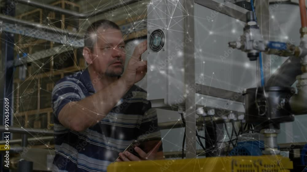 Animation of network of connections over caucasian male engineer using tablet at factory Animation of network of connections over caucasian male engineer using tablet at factory