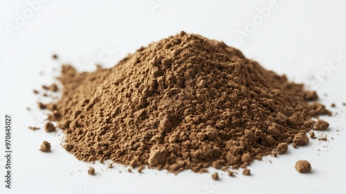 A close-up shot of hojicha powder in a pile on a plain white surface, ideal for culinary and tea-related designs