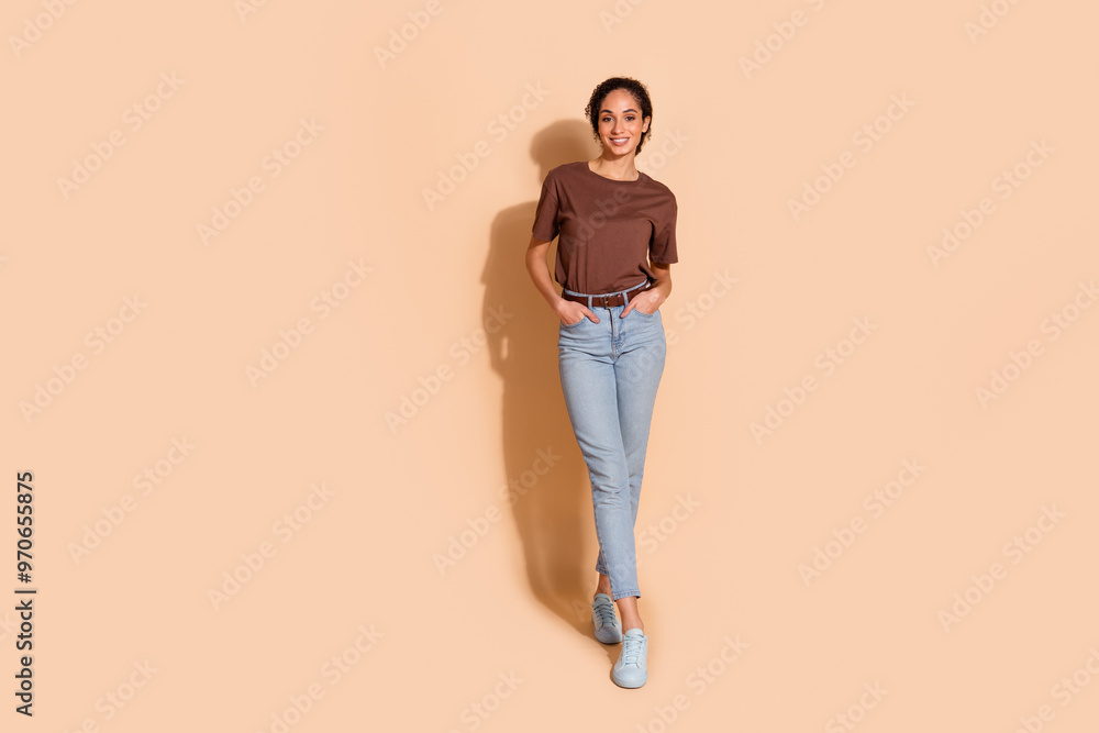Photo of minded clever girl wear stylish clothes sit armchair hand touch head hmm netbook isolated on blue color background Photo of minded clever girl wear stylish clothes sit armchair hand touch head hmm netbook isolated on blue color background