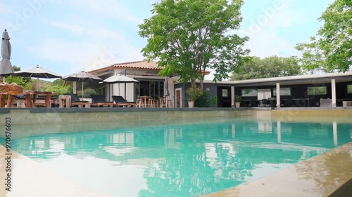 Wallpaper Mural Slow panning shot of a luxury villa in St Colombe with a private pool Torontodigital.ca