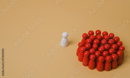 Obraz na płótnie leadership concept, a lonne white figure standing is leader of team business, A team group of people are standing in a circle, Concept of unity and togethernes w salonie