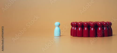 Obraz na płótnie leadership concept, a lonne white figure standing is leader of team business, A team group of people are standing in a circle, Concept of unity and togethernes w salonie