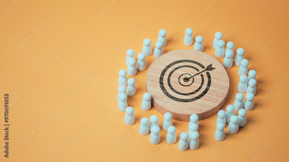 Target concept of business and personnel in a company. wooden dolls standing around icon arrows for creating and targeting business objectives. Marketing solutions, targets for business