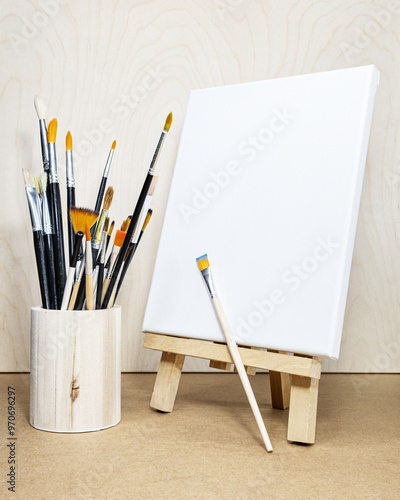 white canvas with brushes