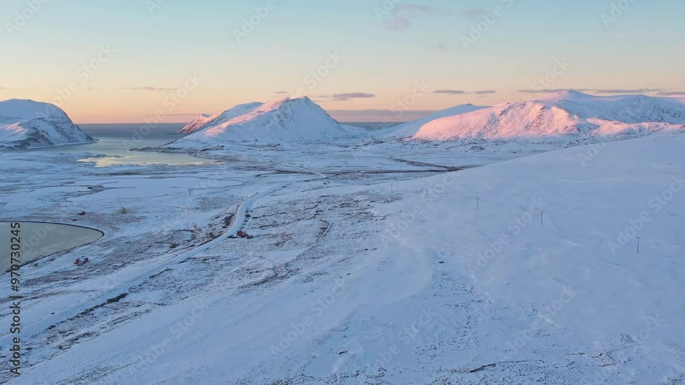 Aerial view, Finnmark region, snow-capped mountains in northern Norway. Aerial view, Finnmark region, snow-capped mountains in northern Norway.