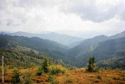 Serene mountain landscape under a cloudy sky
