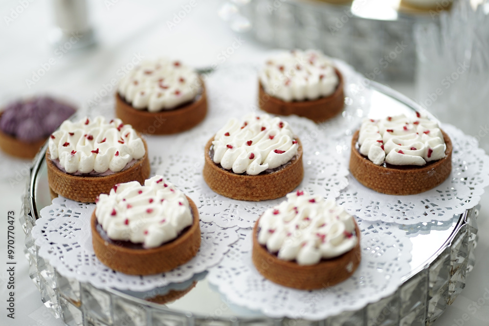 Cookies with cream on a glass stand. Cookies with cream on a glass stand.