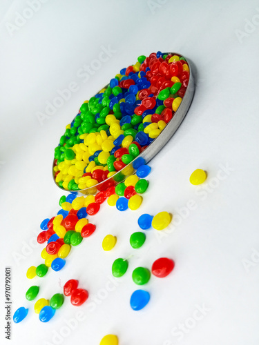 Wallpaper Mural colorful masterbatch granule, colorful pigment, green granules in a cup, cold cutting type granule texture, isolated on white background, for industrial plastic company profile product catalog design Torontodigital.ca