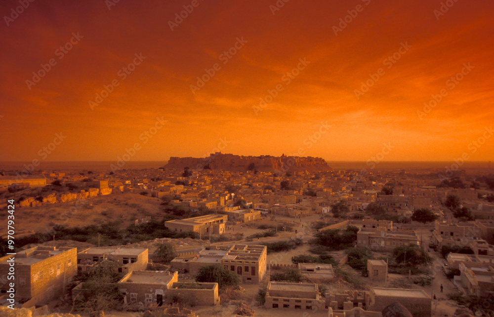 Fototapeta premium a view of the Jaisalmer Fort with the city of Jaisalmer in the Province of Rajasthan in India. India, Jaisalmer, January, 1998