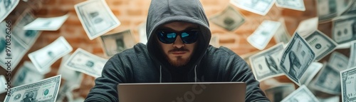 Hooded Hacker Using Laptop ...